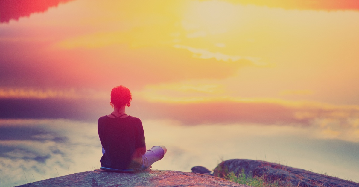 person practicing meditation for mental peace